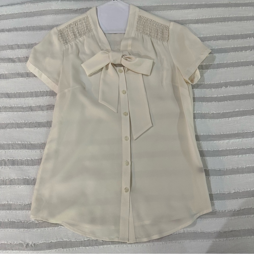 Women’s bow detail blouse.